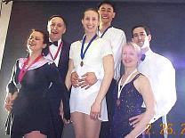 Dancers with medals.